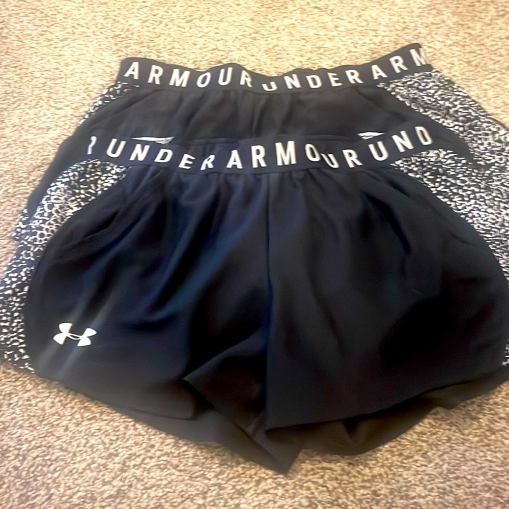 Two pair of short underarmour workout shorts